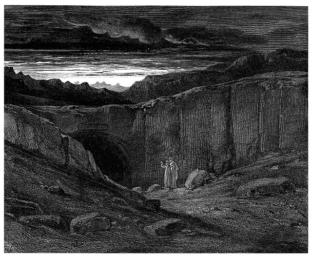 Black and white drawing by Gustave Doré of Dante's Inferno: two small figures stand in front of a black cave opening, the Gates of Hell, amidst dark rolling hills and clouds