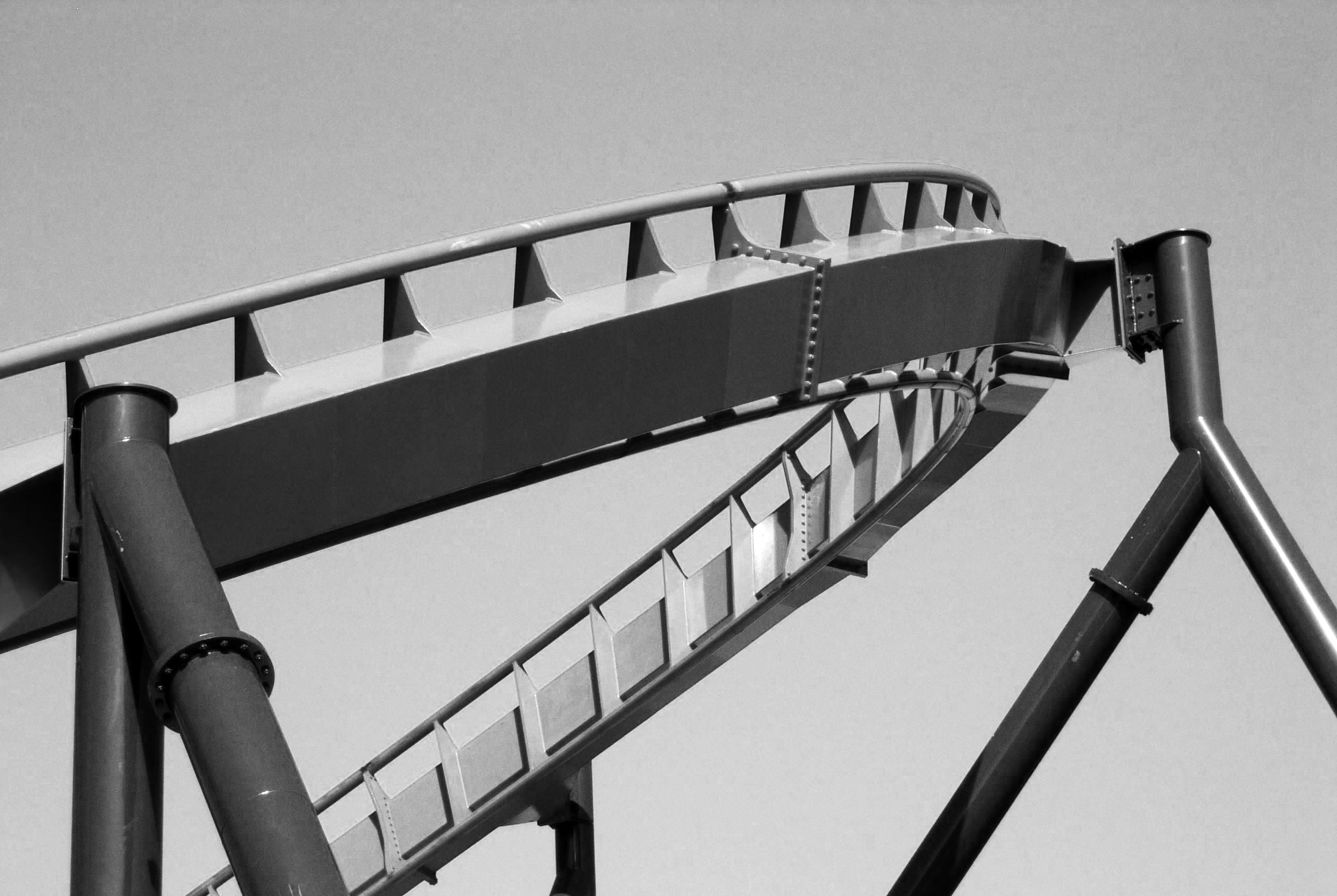 Black-and-white image of a roller coaster track loop